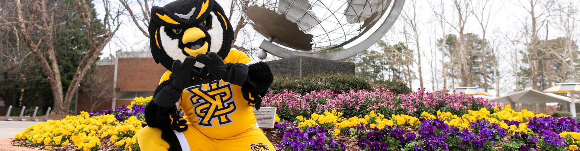 Scrappy in front of the Globe on the Marietta Campus